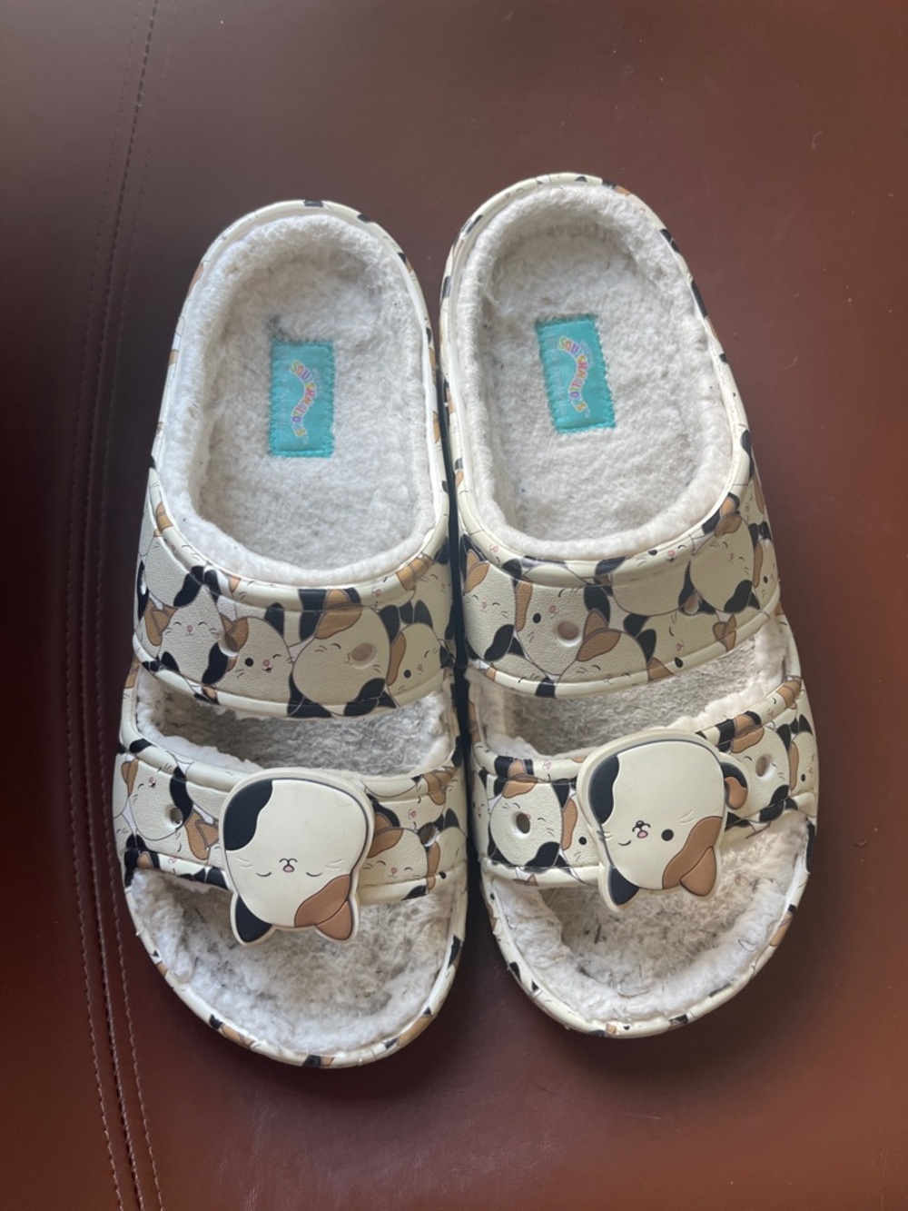 Women’s 7 Crocs Squishmallow Cam Calico Cat Print Fleece-Lined Slide Sandals